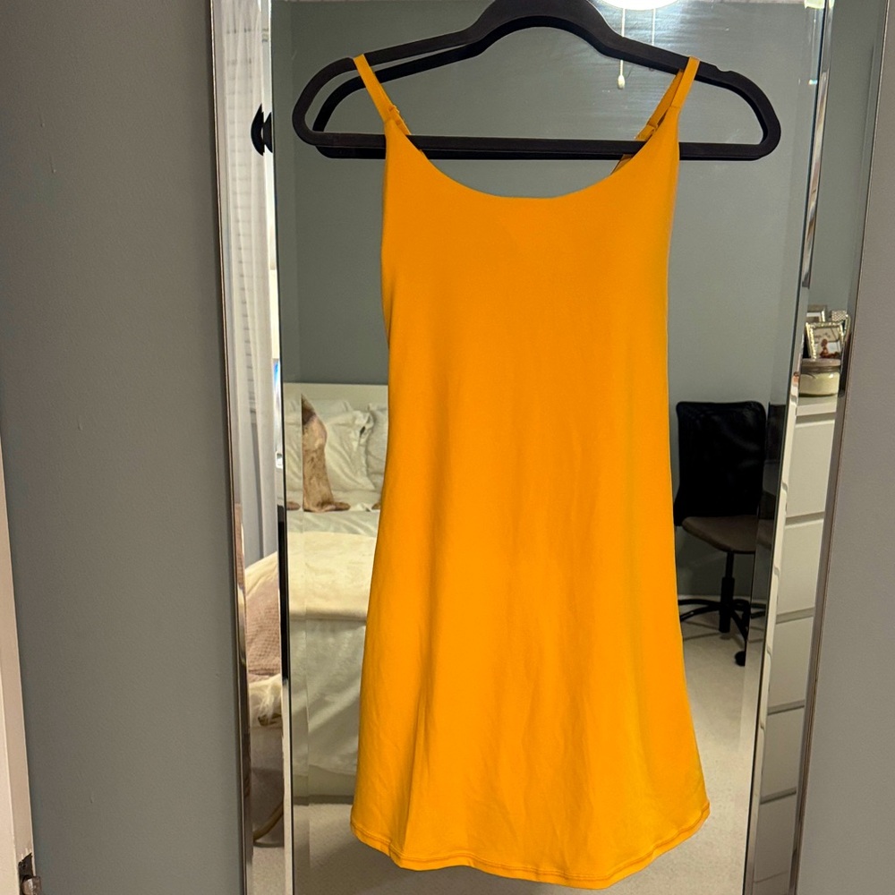 Yellow sports dress.Jafinsy created products to support those who love sportsM